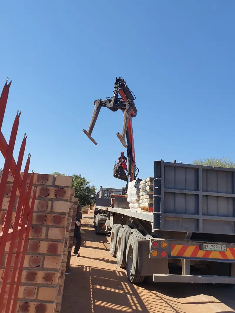 Crane offloading materials
