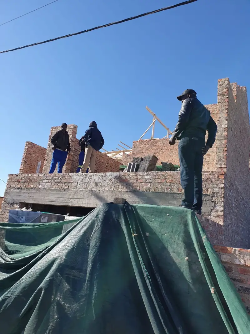 Site team on a roof structure